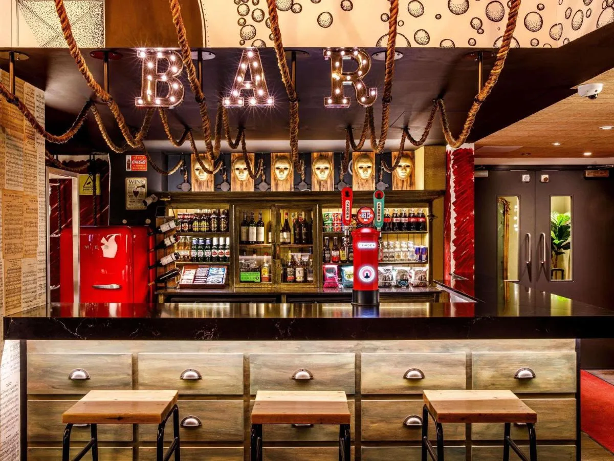 Wooden stools at the hotel restaurant bar